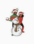 an ornament front featuring a black couple with a snowman