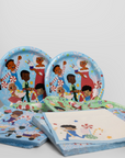 Children's party supplies with paper plates and napkins featuring multicultural children on a white background.