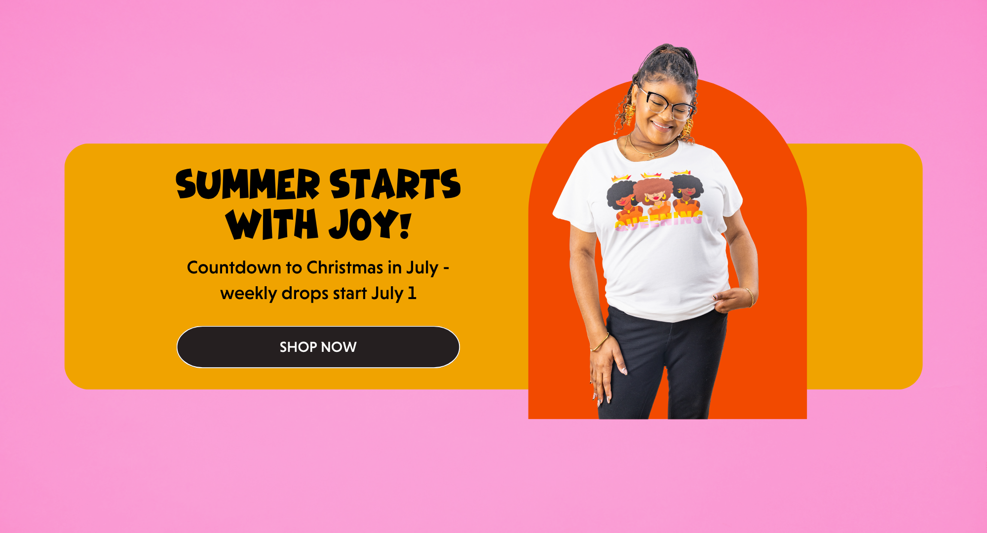 “Jae smiling in a vibrant summer tee that celebrates Black joy. Bold banner text reads ‘Summer Starts With Joy!’ promoting the upcoming Christmas in July drops.”