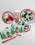Christmas-themed paper plates and napkins with festive designs on a white background