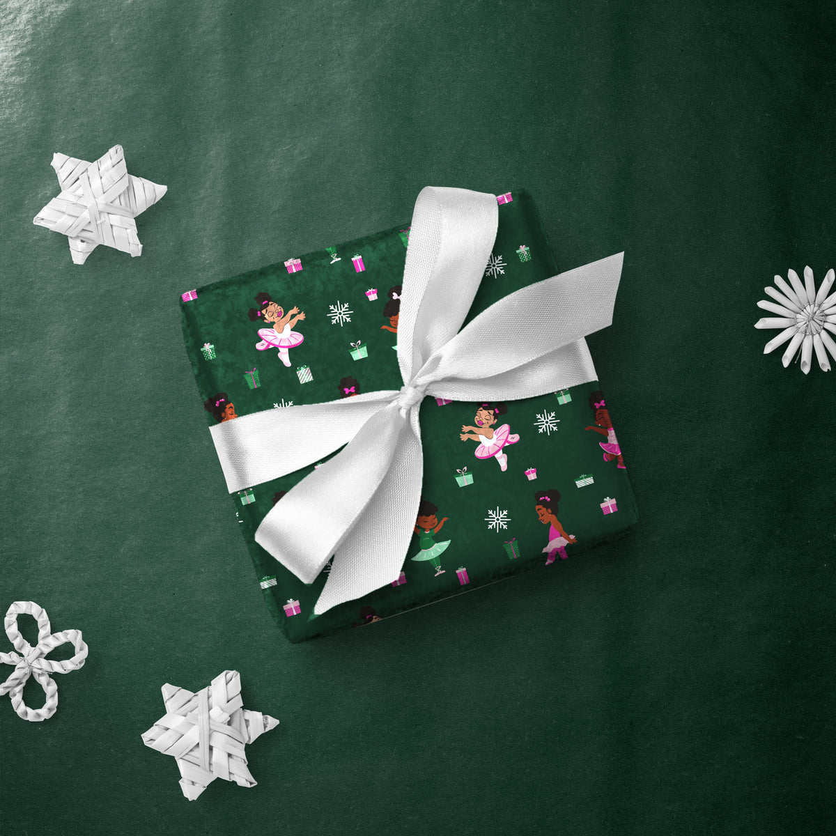 Gift box wrapped in Baby Ballerina gift wrap with a white ribbon