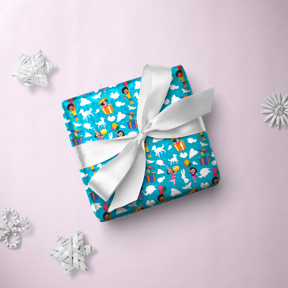Gift box wrapped in Cloud Celebration gift wrap with a white ribbon