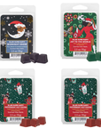Four packages of Black Paper Party scented wax melts with different designs and scents.