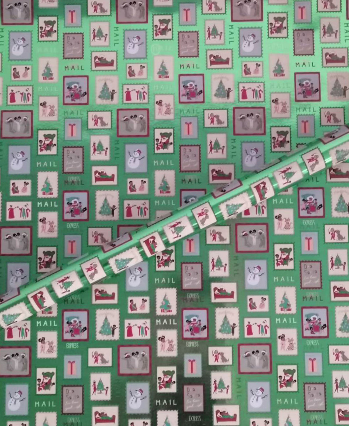 Letters to Santa gift wrap with illustrated holiday postage stamps.