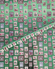 Letters to Santa gift wrap with illustrated holiday postage stamps.