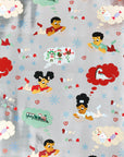 Letters to Santa gift wrap with illustrated Black children and angels on a pale blue background.