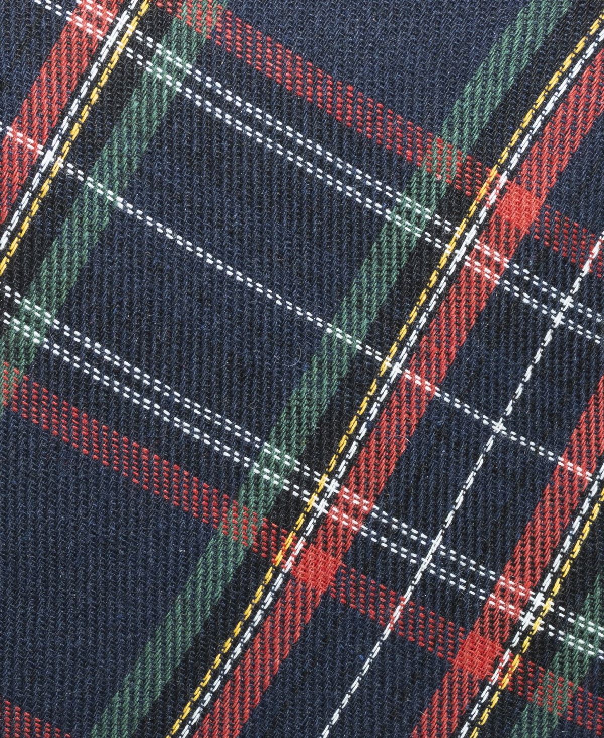 Plaid fabric detail on the Nana Klaus Noire Noel holiday stocking.