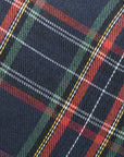 Plaid fabric detail on the Nana Klaus Noire Noel holiday stocking.