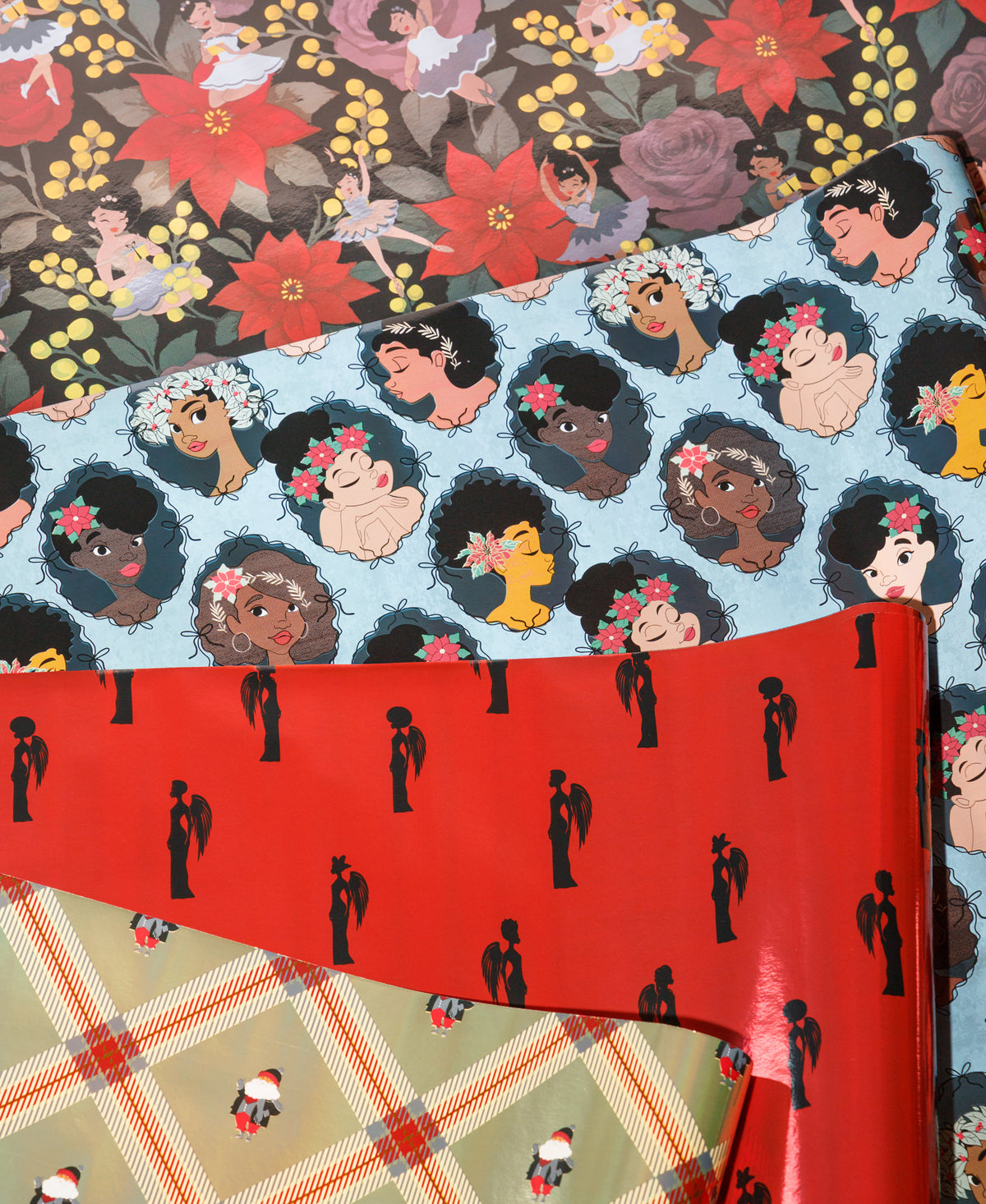 Four coordinating Noire Noel gift wrap patterns featuring Santa, elegant couples, portraits and dark florals.