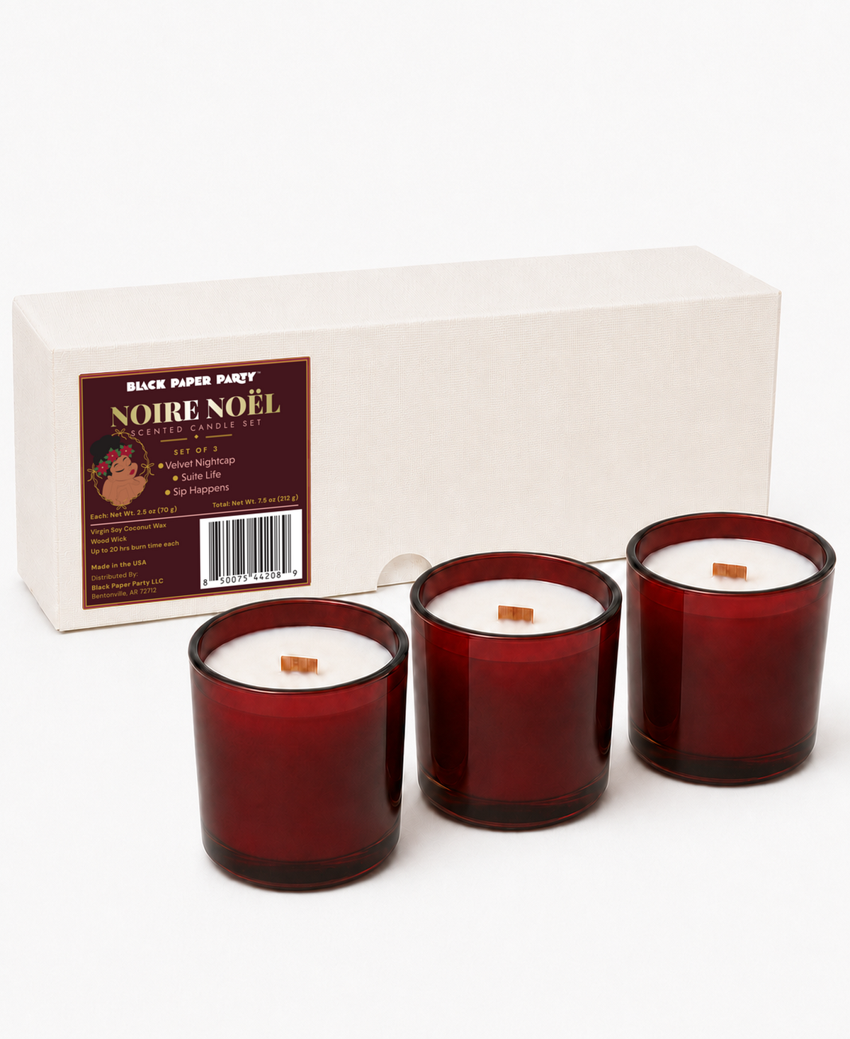 Black Paper Party Noire Noel three-candle gift set with burgundy glass vessels, wood wicks and a blush gift box.