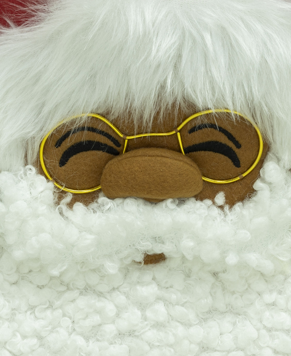 Close-up of Papa Klaus with a white beard and glasses on the Letters to Santa stocking.