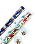 Black Paper Party We Outside foil gift wrap set with three rolls featuring train, ski and cable car designs and coordinating gift tags.