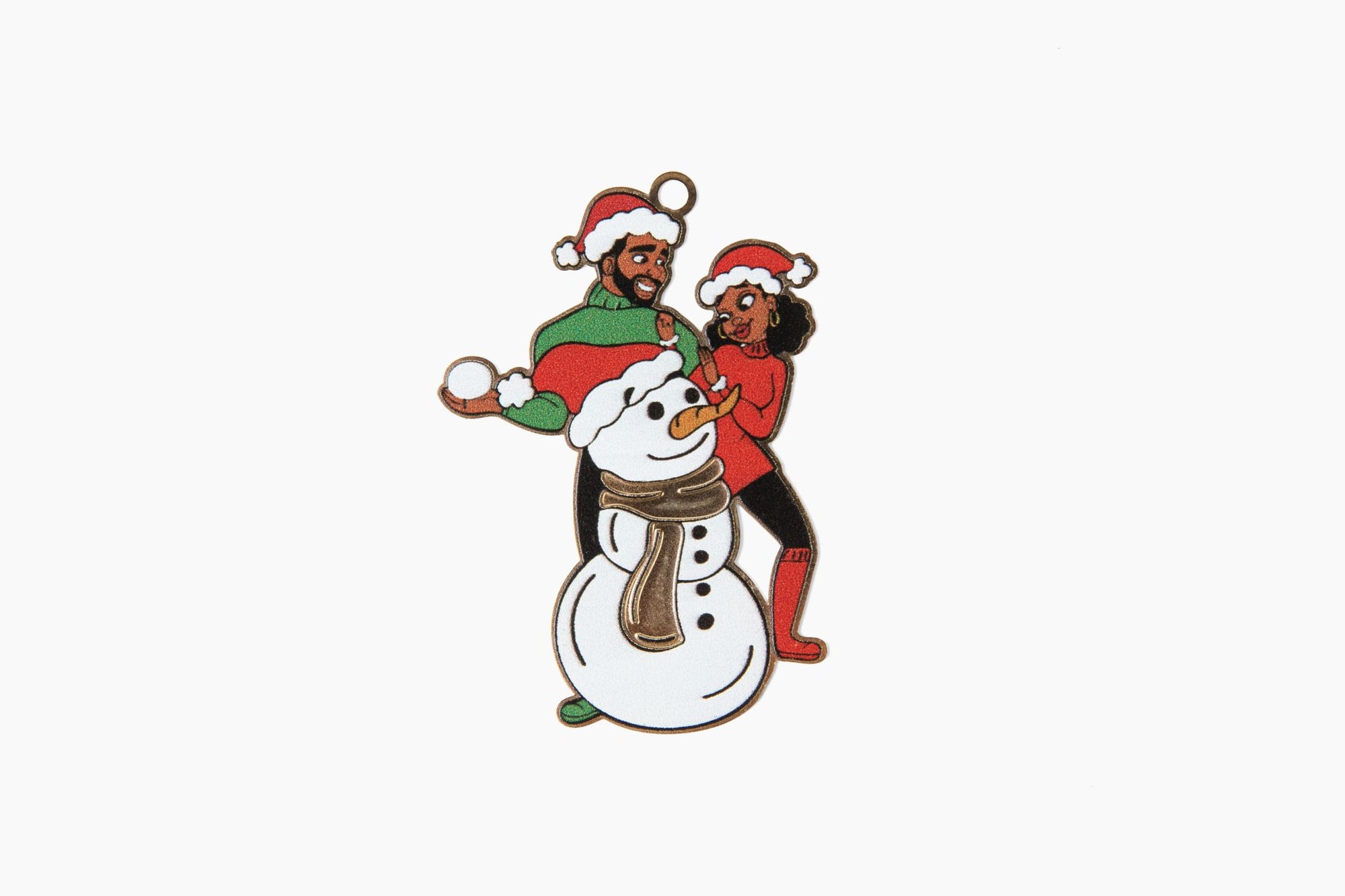 an ornament front featuring a black couple with a snowman