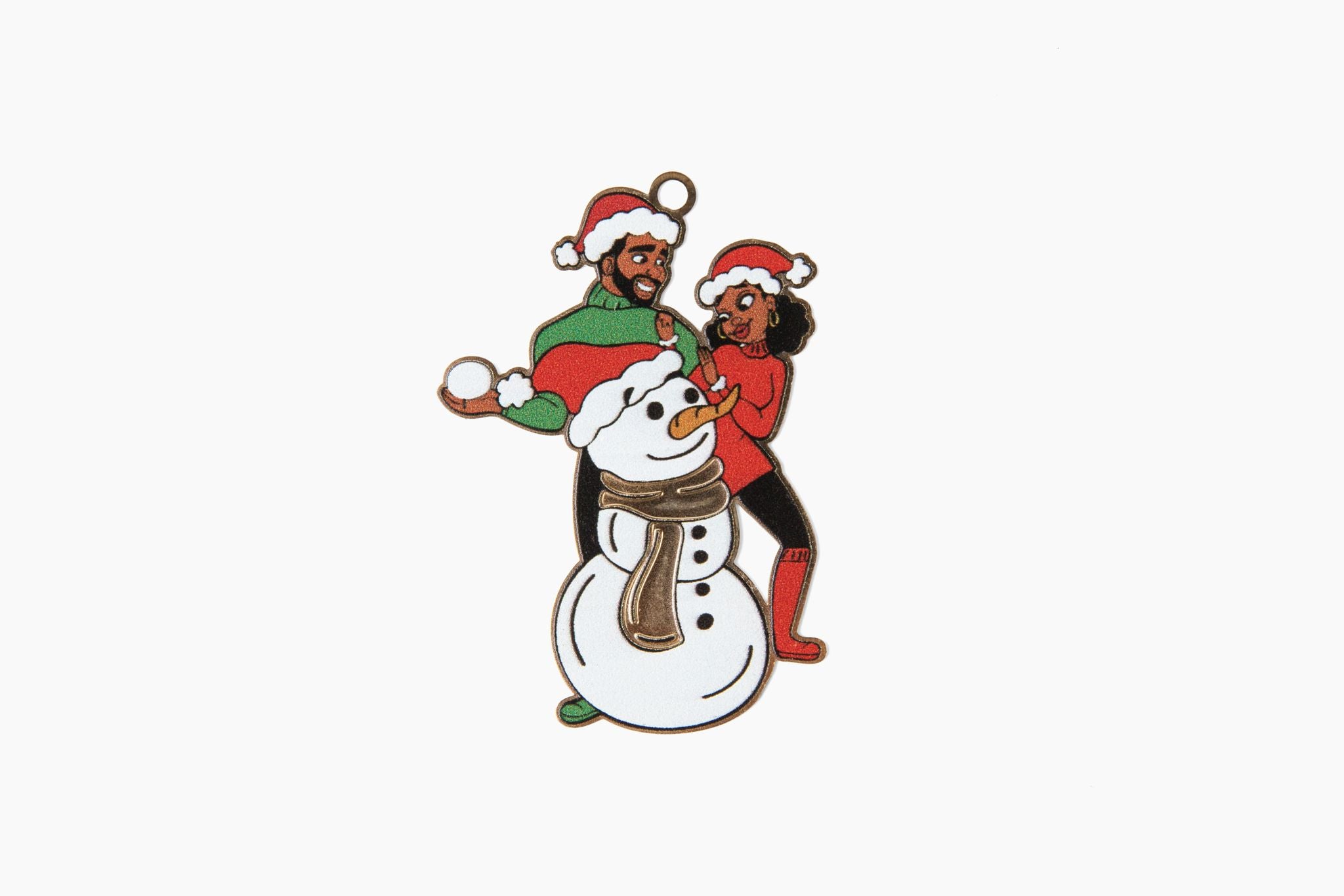 an ornament front featuring a black couple with a snowman